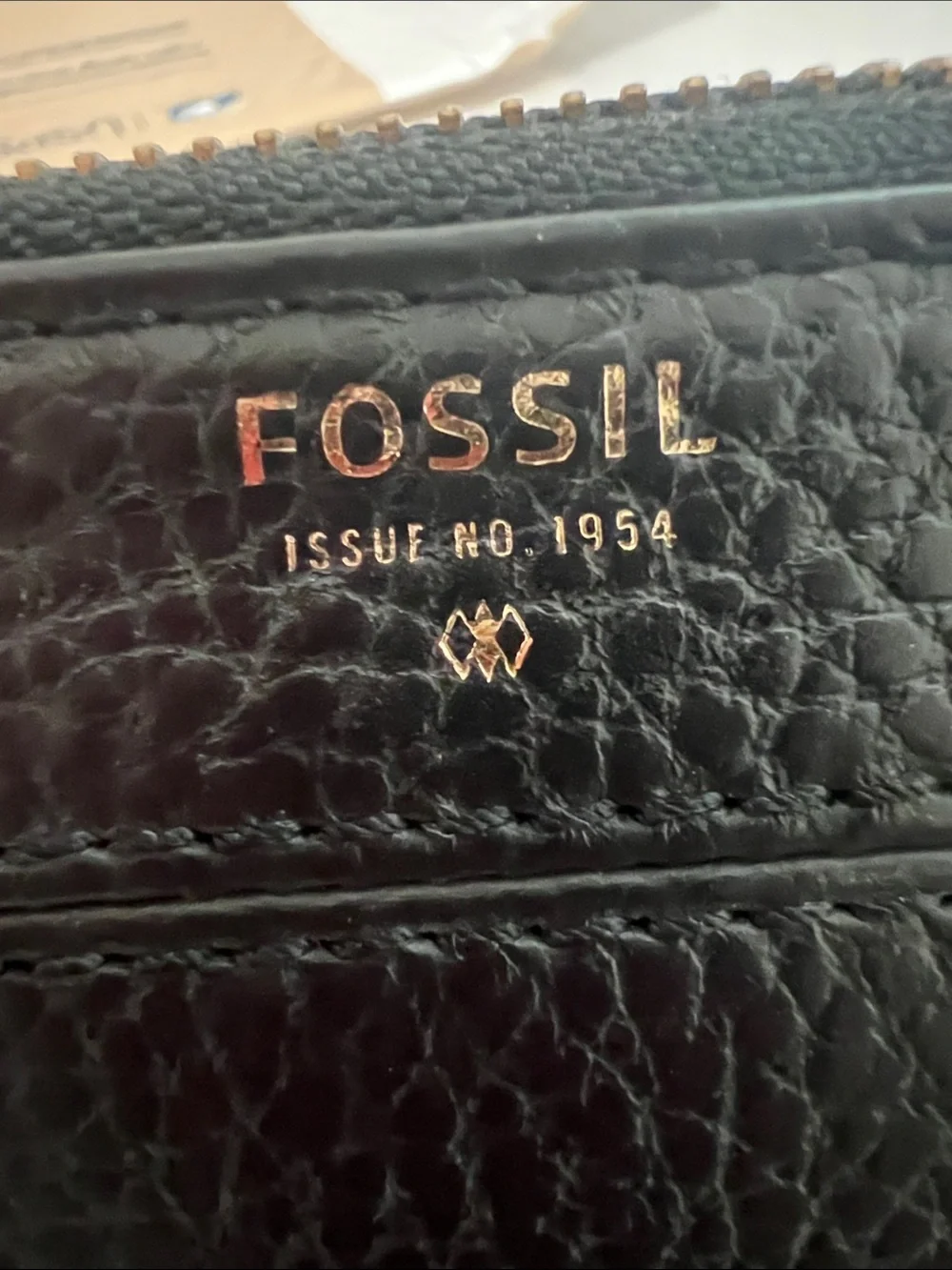 Fossil Black Leather Wristlet Wallet with Pink Tassel Charm
